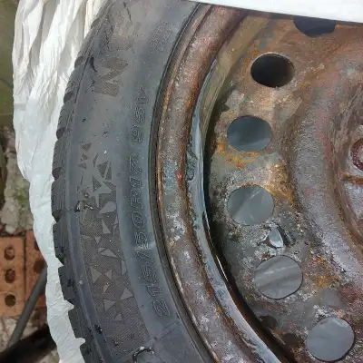 Was for a Honda Civic 2018 Touring. Rims are rusted, but still functioning. Tires were used for HALF...