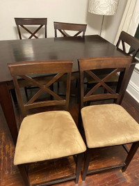 Wooden dining table and 8 chairs