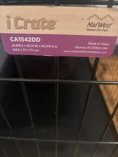 Selling XL dog crate , good condition. 2 doors . For large dog .