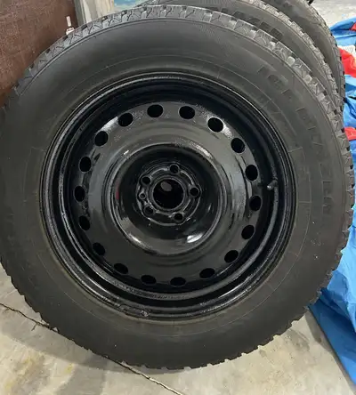 Winter tires and steel rims 5 x 1.08 bolt pattern Lots of tread on tires Salun Ice Blazer 235-65-18...