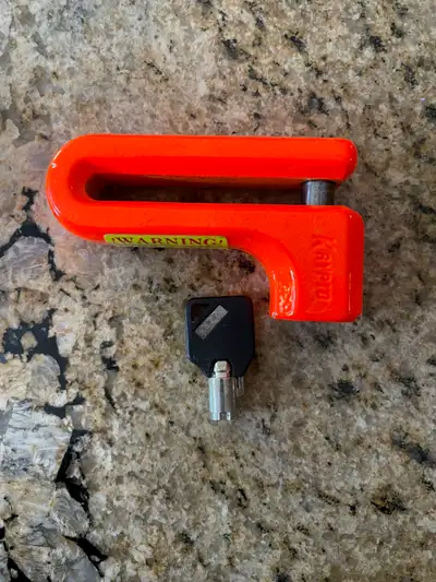 Disc lock by Krypto. Comes with 2 keys. Like new. The lock is about 3.5" long.