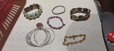 SIX FASHION BRACELETS, View more