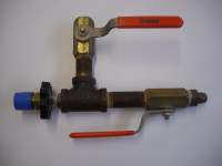 Systeme de valve pour la purge de bonbonnes/propane