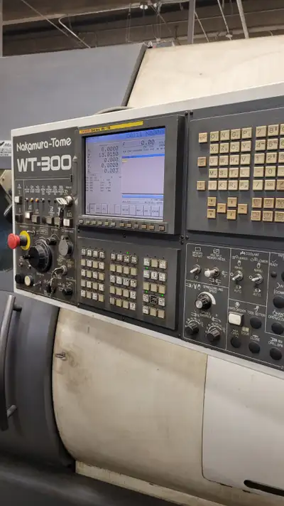 1 USED CNC LATHE MAKE NAKAMURA-TOME MODEL WT300 YEAR 2005 EQUIPPED WITH FANUC CONTROLS 18I-TB Max. s...