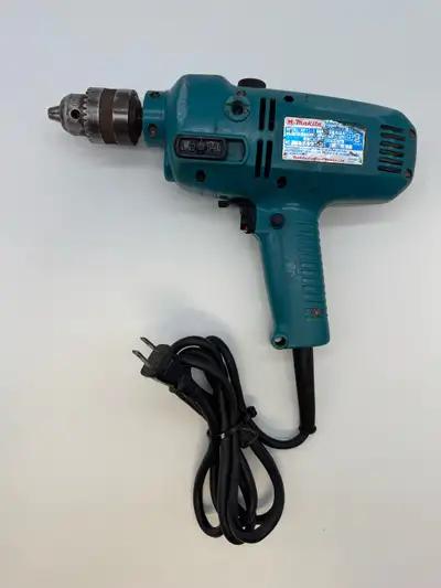 Makita HP1310 13mm Hammer Drill 500W Variable Speed  Working, View more