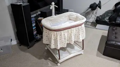 Soothe your baby to sleep with this gently Gliding Beside Bassinet with Mobile Attachment, 2-Section...