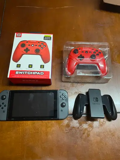 nitendo switch avec manette pro, View more
