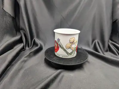 A Tuscan Village Dip Chiller, which is a ceramic container designed to keep dips cool. It consists o...