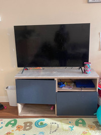 TV with a tv table 