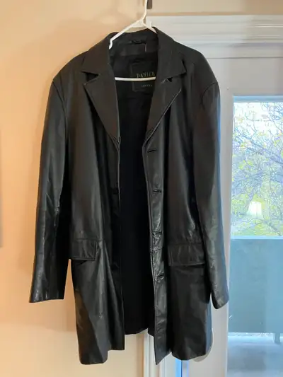 Danier leather Jacket with long sleeves. Excellent condition, one owner, non-smoker.