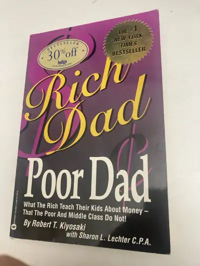 This is a copy of the book Rich Dad Poor Dad by Robert Kiyosaki, offering insights into financial li...