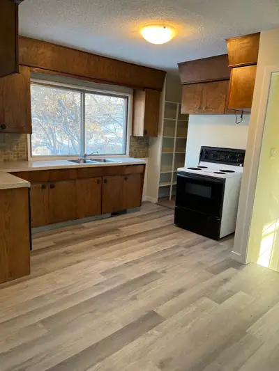 2 bedrooms upstairs 2 down. All appliances. Large garage. Plenty of parking. Fenced yard.