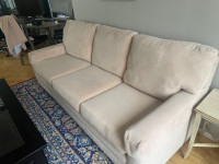 Solid beige couch with cover, great condition