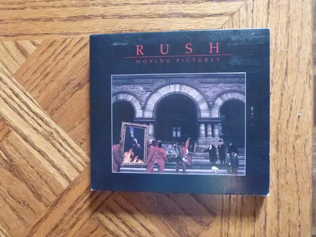 Moving Pictures Deluxe Edition – Rush (CD/DVD)    mint   $12.00632345266333471213