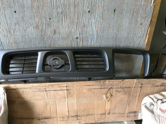 Brand new front grill for 99 Nissan Frontier $80 in Auto Body Parts in Calgary