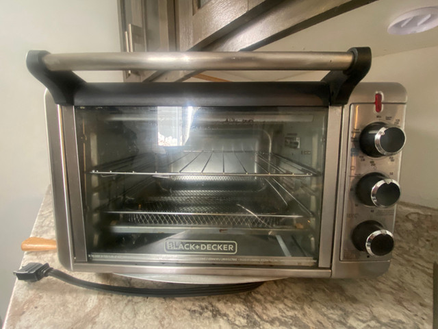 Black+ Decker crisp n bake air fryer toaster oven  in Toasters & Toaster Ovens in St. John's