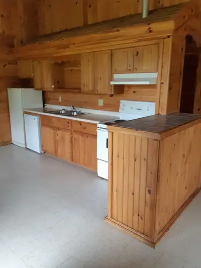 Log Home (duplex) Located on a semi secluded 20 Acres, Waterfront Estate in Margaretsville..15 to 20...