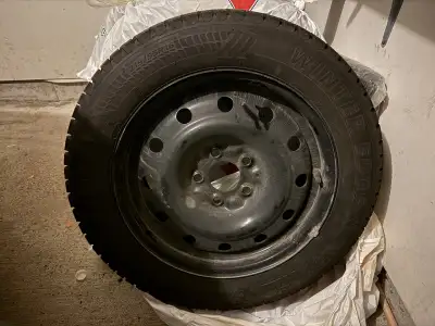 Four like new winter tires on rims, 215/55R16. Were purchased late last winter for a Honda Civic and...