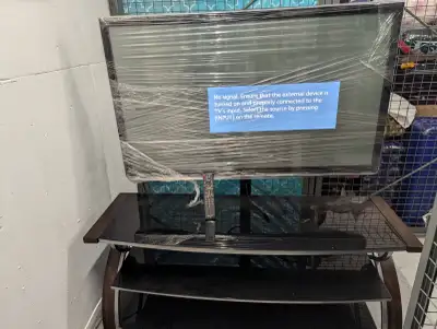 50' Panasonic TV (w/ remote) on stand/ shelf, View more