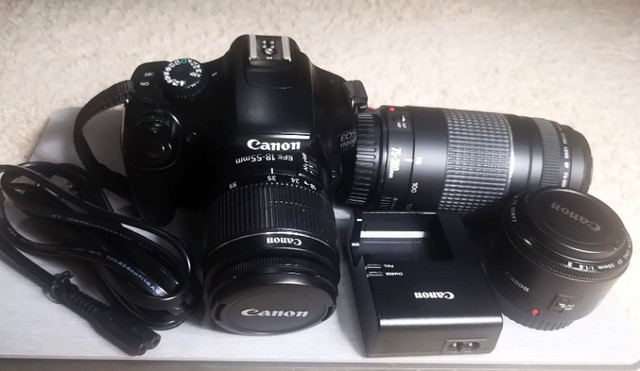 Canon DSLR camera EOS 1100D With 3 kit lenses, bag, charger in Cameras & Camcorders in Regina