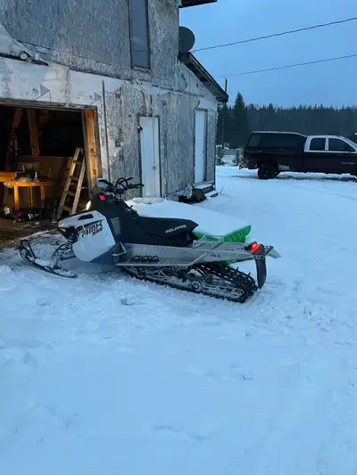 800 cc 155 inch track 200 miles on a rebuilt No trades