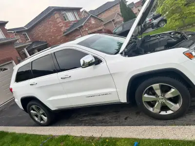 2014 Jeep Grand Cherokee Limited – White Clean title 176,000 km Runs and drives perfectly with no is...