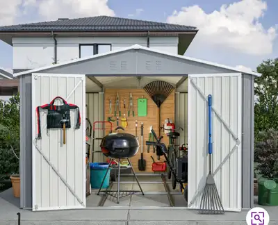 10 x 10 Metal Storage Shed with foundation floor frame. Box never opened. Pick up only. Located in H...