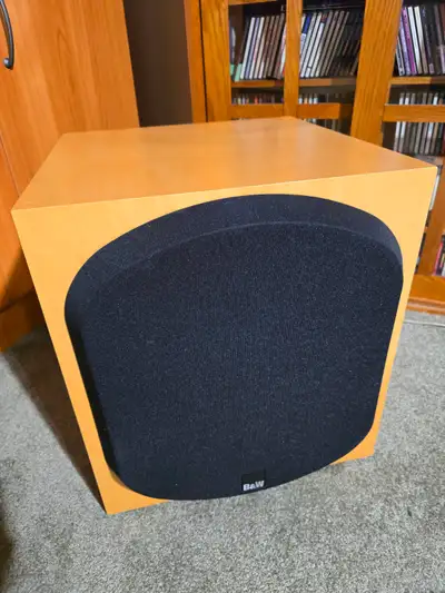 B & W Subwoofer ASW 750. The 12-inch driver in the ASW750 subwoofer, driven by a rated 1000W of clas...