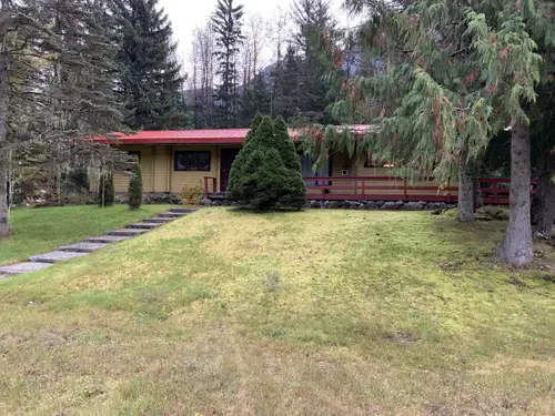 This 1,494 sq. ft. Pan-Abode cedar home features tongue and groove log construction, with a large co...