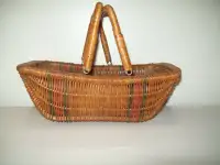 wicker basket with green red stripes