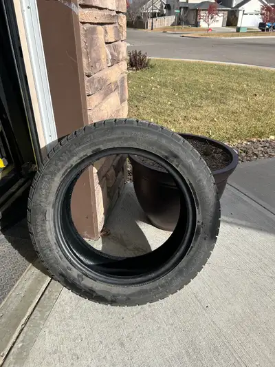 SET OF FOUR Uniroyal Tiger Paw Winter tires. 235/55 R 18. Used only last winter. Selling because the...