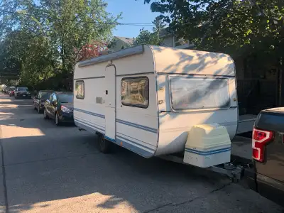 Vintage travel trailer. Requires renovation. Water tight. Consider it a shell. It still has an inter...