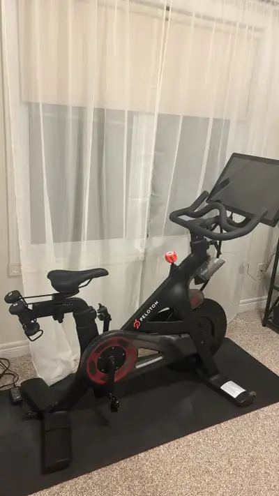 Peloton Bike with accessories & shoes, View more