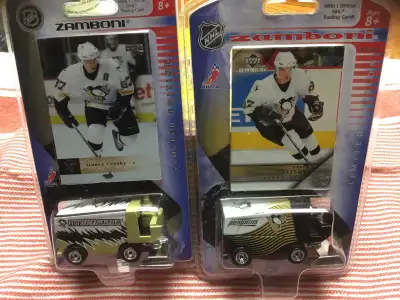 You are looking at two Sidney Crosby Zamboni with hockey card included PACKAGES ARE IN VERY GOOD CON...