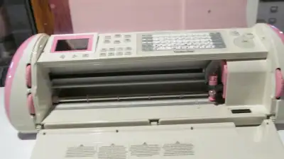 PRICE DROP FIRM What would you get with the Cricut cutter is the following cartridges: Love Struck,...