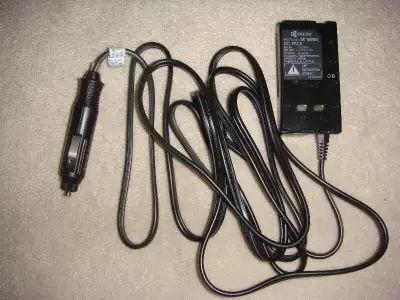 Kyocera model DC 1500U camcorder DC Pack. 12 and 24V DC in and 6.5V 2.0A out. Originally from a Hi8...