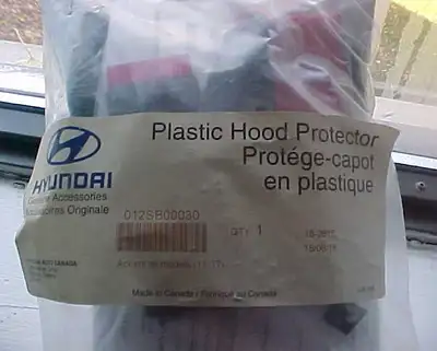 SELLING THIS BRAND NEW NEVER OPENED HYUNDAI ACCENT BLACK PLASTIC HOOD PROTECTOR/BUG DEFLECTOR, FITS...