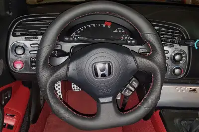 K Hello, RS Performance Inc provides custom steering wheel wrapping with all options. www.rsperforma...