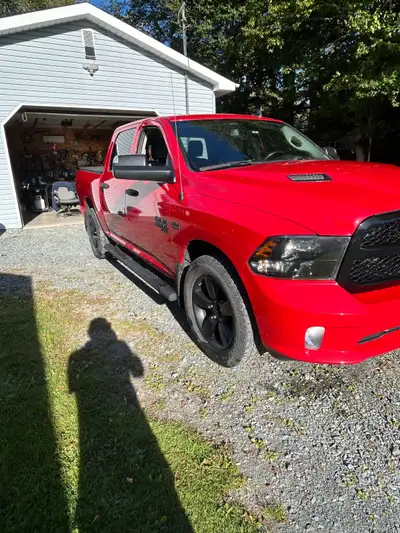 Dodge Ram like new , comes with new summer tires ,tonneau cover