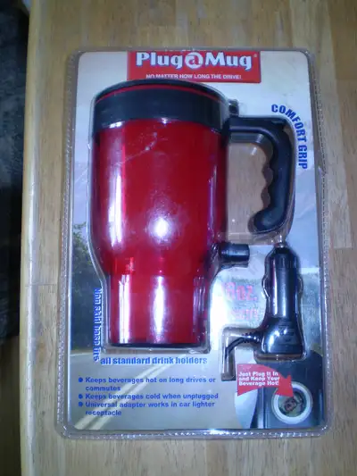 Four Coffee mug with built-in 12 volt heater to keep your coffee warm or re-heat. Meant for for use...