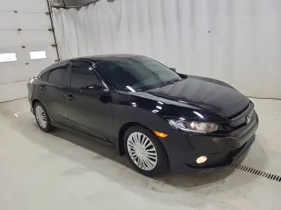 Civic Sport sedan , low original 48988 certifié , automatique , full loaded , winter tires , rebuilt...