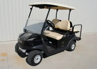 2020 Black Club Car Tempo Electric Golf Cart. Rearseat, lights and reducer. 85 min Trojan batteries....