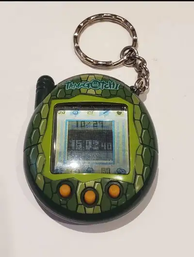 Tamagotchi Reptile Green 2004 Edition., View more