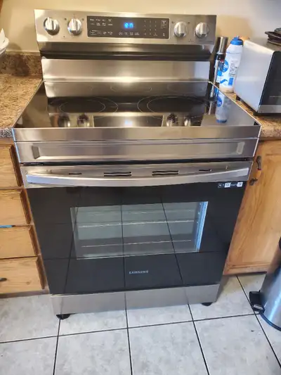 Samsung stainless steel electric Range convection oven in excellent functioning condition like a new...