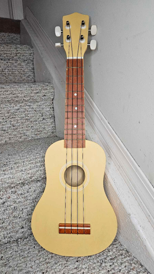 4 String ukulele (Yellow) in String in Edmonton