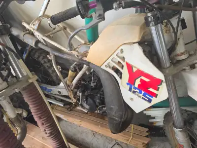These two 1987 Yamaha YZ 125 motocross bikes are used, non-running projects perfect for a dedicated...