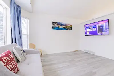 Furnished with beds, table, chairs, sofa, and basic kitchenware! The rent is for the main floor of a...