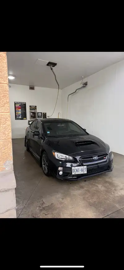 2015 Subaru WRX STI with ~80,000 km, only two owners, clean title and no accidents. Adult-owned and...