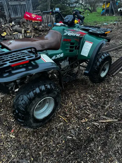 Polaris 300 explorer 4x4 2 stroke. Needs a starter and battery. (I have the new starter) Have owners...