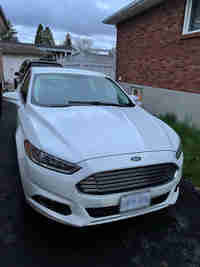 2013 Ford Fusion SE Eco Boost in Mint condition $11,995.